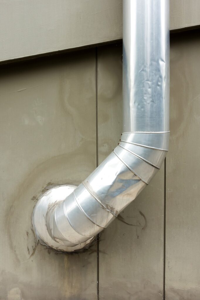 Air passage tube on building wall
